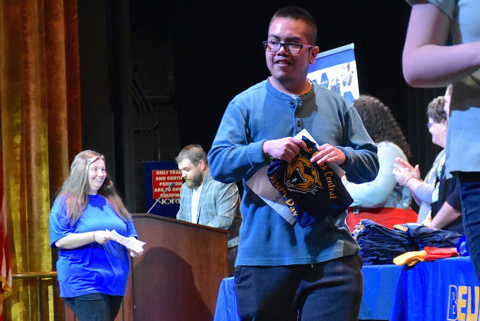 Students walk across the stage at W.K. Kellogg Auditorium as their names and college choices were announced.