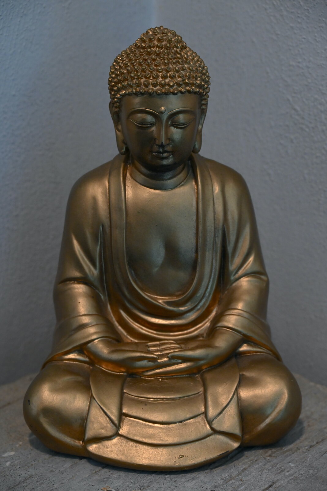 Statues of the Buddha inside and outside the SokukoJi Buddhist Temple Monastery in Battle Creek.
