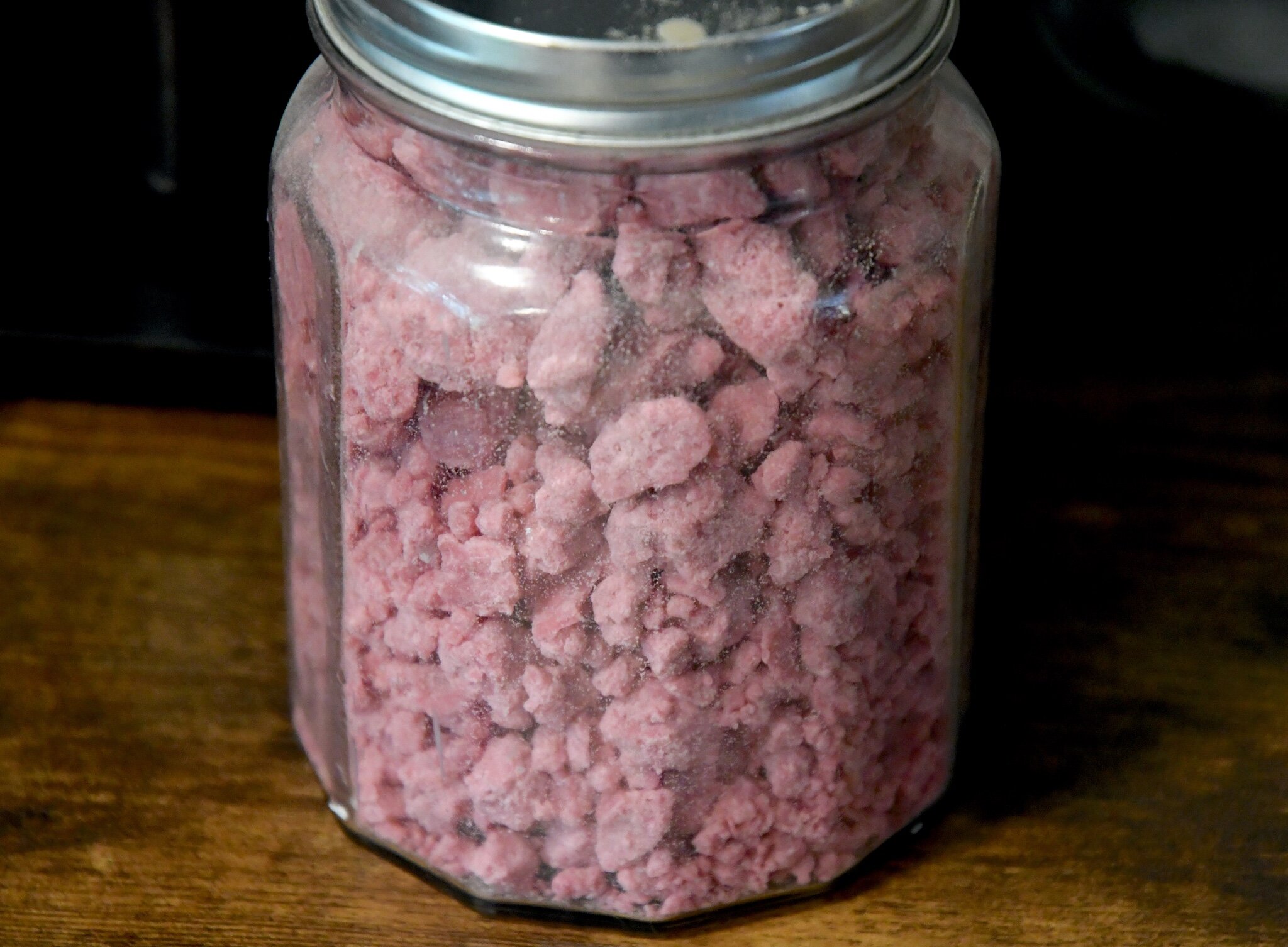 A jar of scented wax for room fresheners
