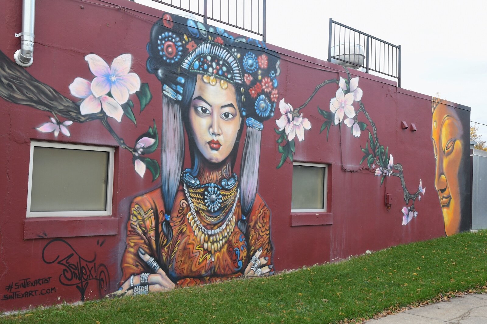 A mural on the outside of the building occupied by Ciao Bella Chocolat.