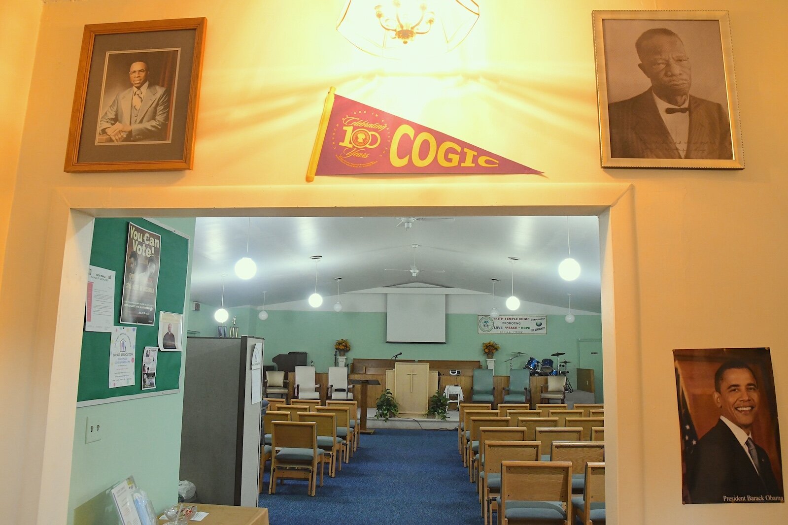 Upon entering Faith Temple Church of God in Christ one is greeted with pictures of, from left, Jessie W. Hooper, founder of the church, Charles Harris Mason, founder of the Church of God in Christ, and Barack Obama, below right.