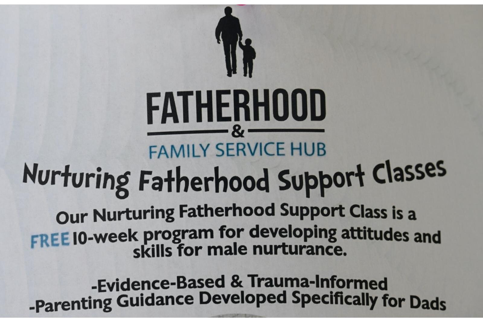  Information about resources for fathers is located on a bulletin board the Fatherhood Family Service Hub on West Michigan Avenue.