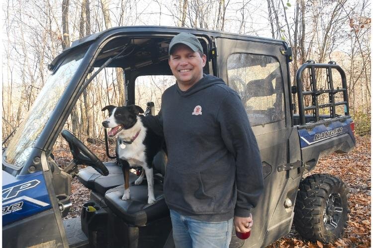 Chris Wolters and Riley are out in some of the 27 acres of Fluffy Butt Farms.