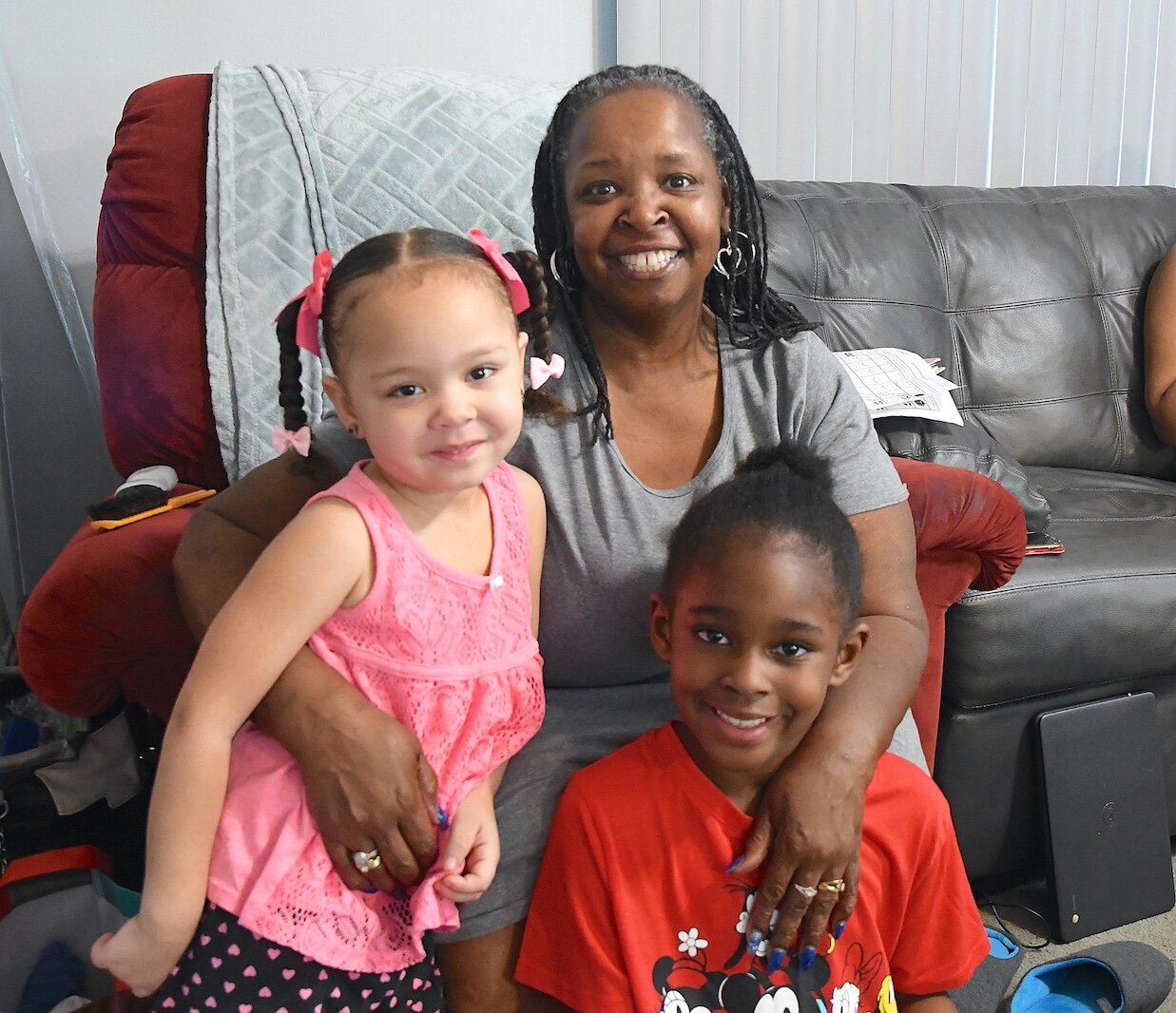 Marcia Trigg sits with two of her daughters, from left, Elloise, 3, and Ellenah, 7.