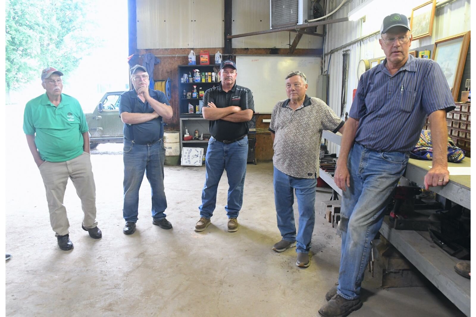 Fred Heaton, right, and other rural residents of Clarendon Township in Calhoun County are concerned about the poor quality of the roads where they live and work.