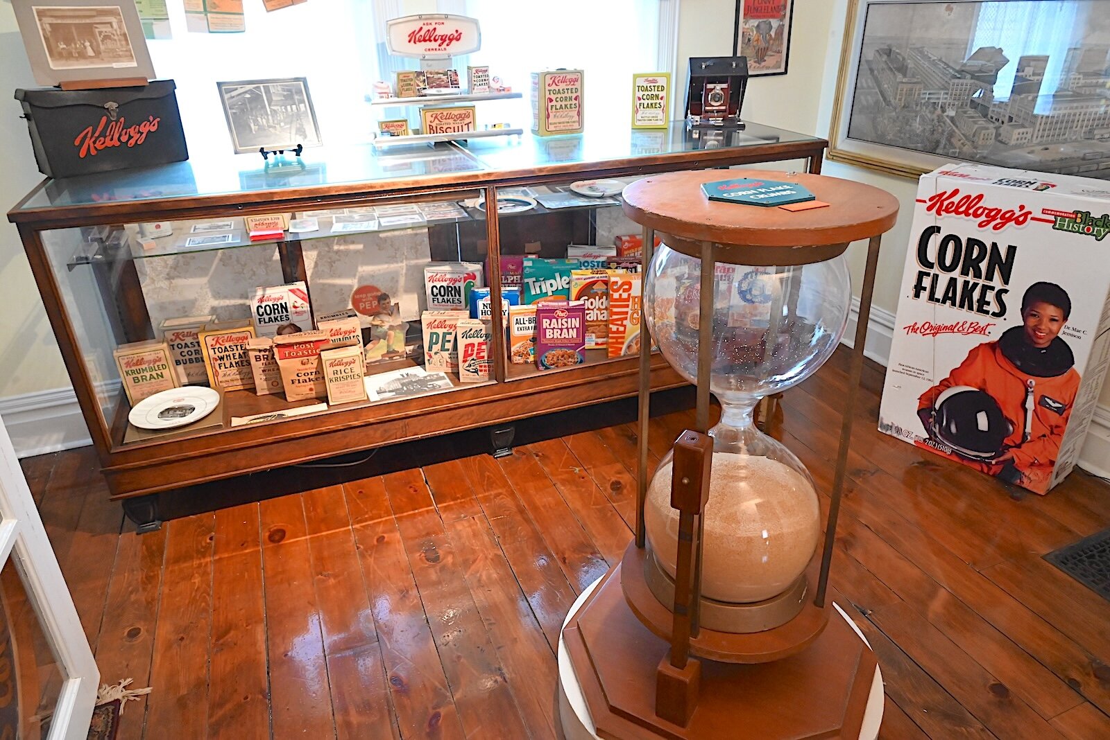 An hourglass that was used to time the length of tours at Kellogg’s cereal plant and other Kellogg memorabilia are inside a room at Kimball House.