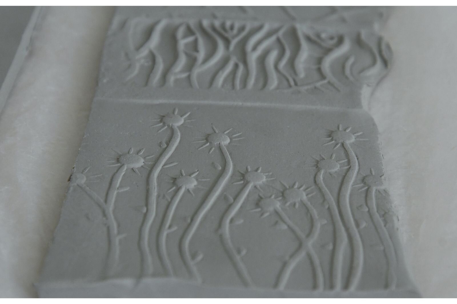 Some sample designs on clay.