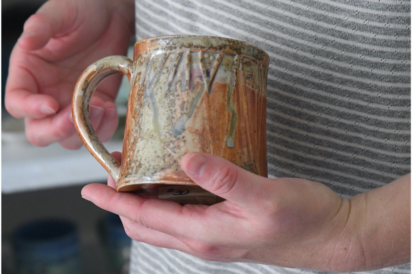 Laura talks about the designs on this mug.