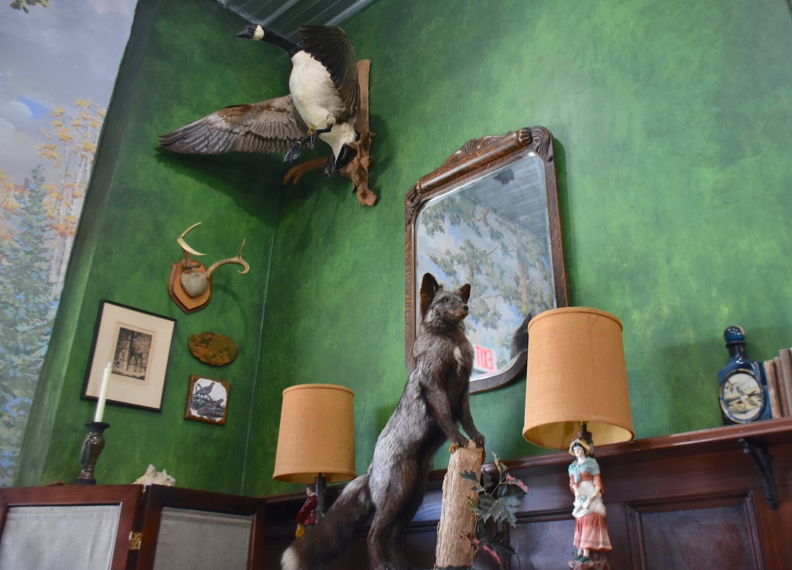 Assortment of the decor in the Huntsman’s Hound Lounge in downtown Marshall.