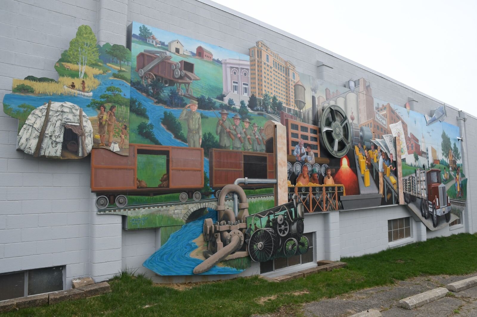 A mural, donated by Battle Creek Unlimited, depicts the history of Battle Creek outside the Battle Creek Regional History Museum.