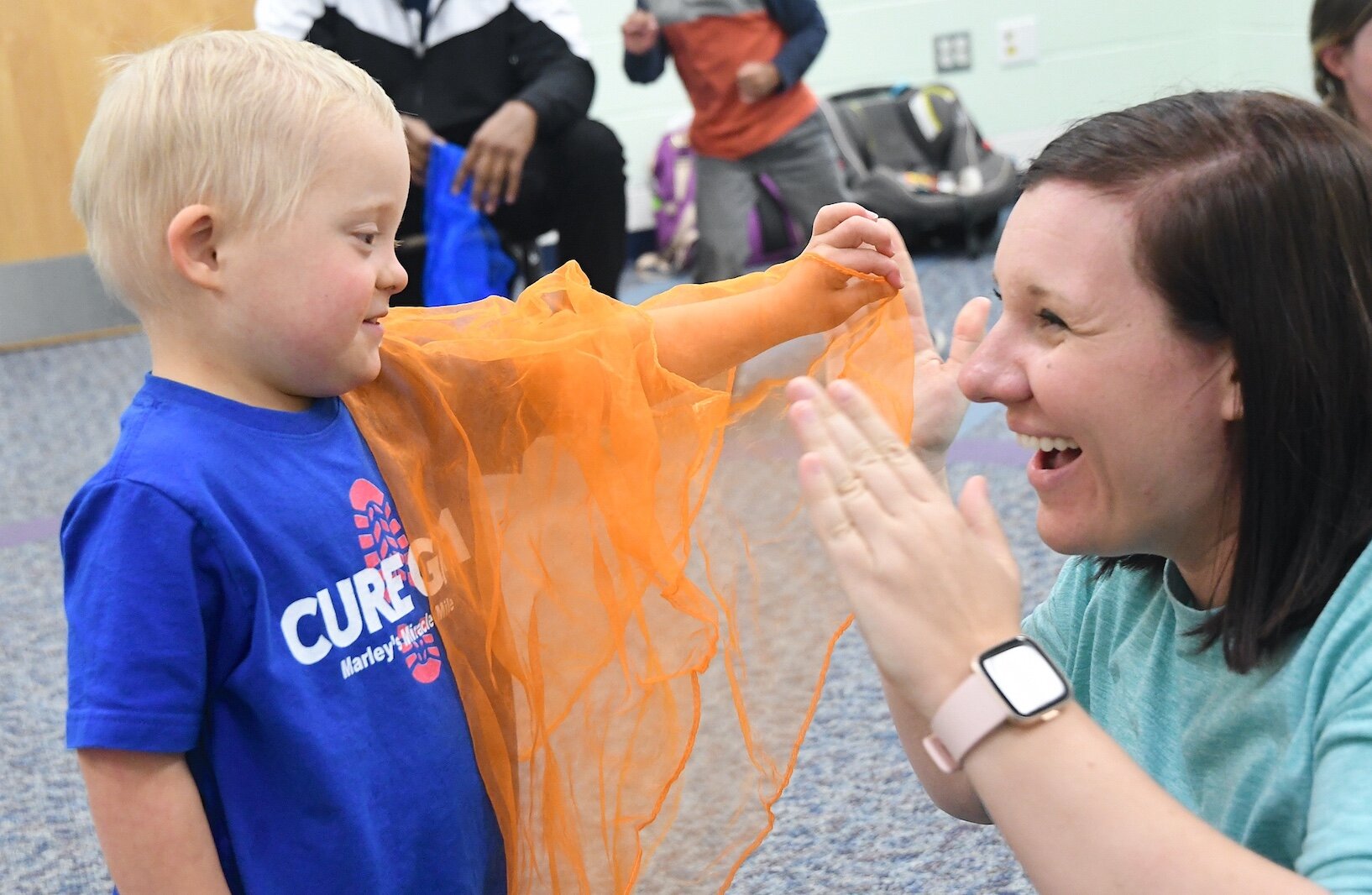 Frankie Boughton, 4, and Teri Noaeill, instructor, play together during a Music First session at the Music Center.