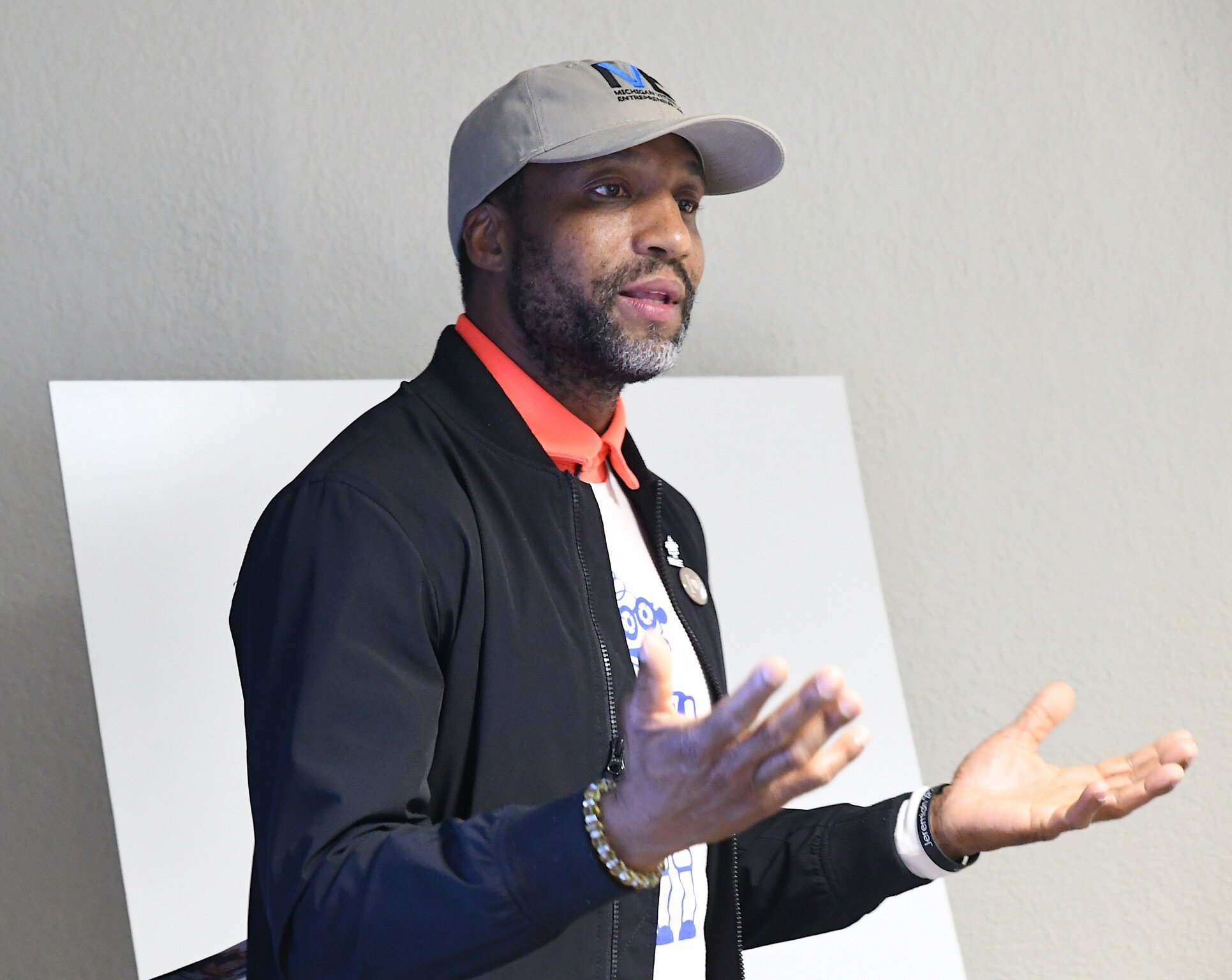 Michael Hyacinthe, a U.S. Navy veteran and entrepreneur makes a presentation presenters during the opening session of the Michigan Veteran Entrepreneur Lab session in Battle Creek.