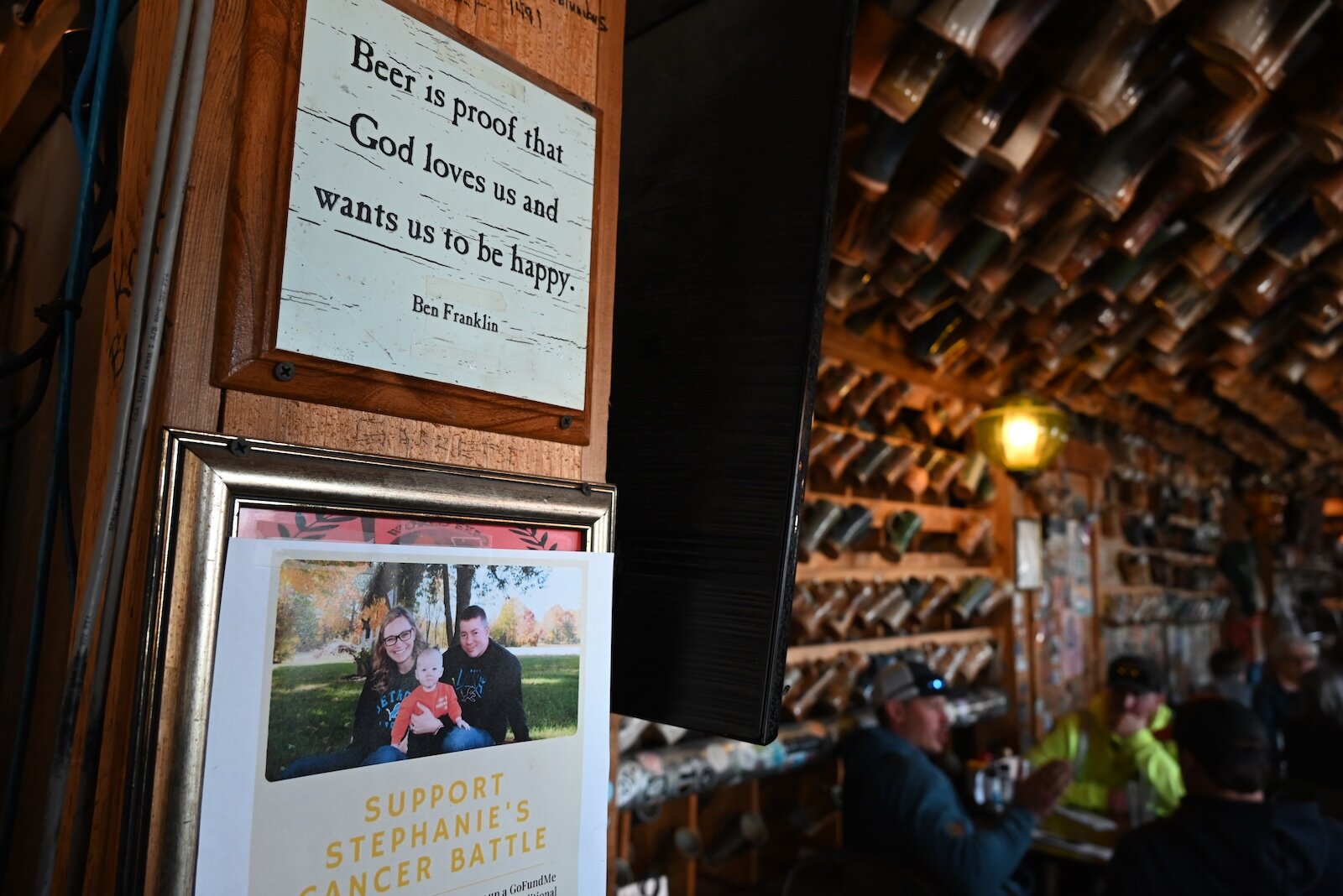 Scenes inside Dark Horse’s tap room feature some of the hundreds of mugs.