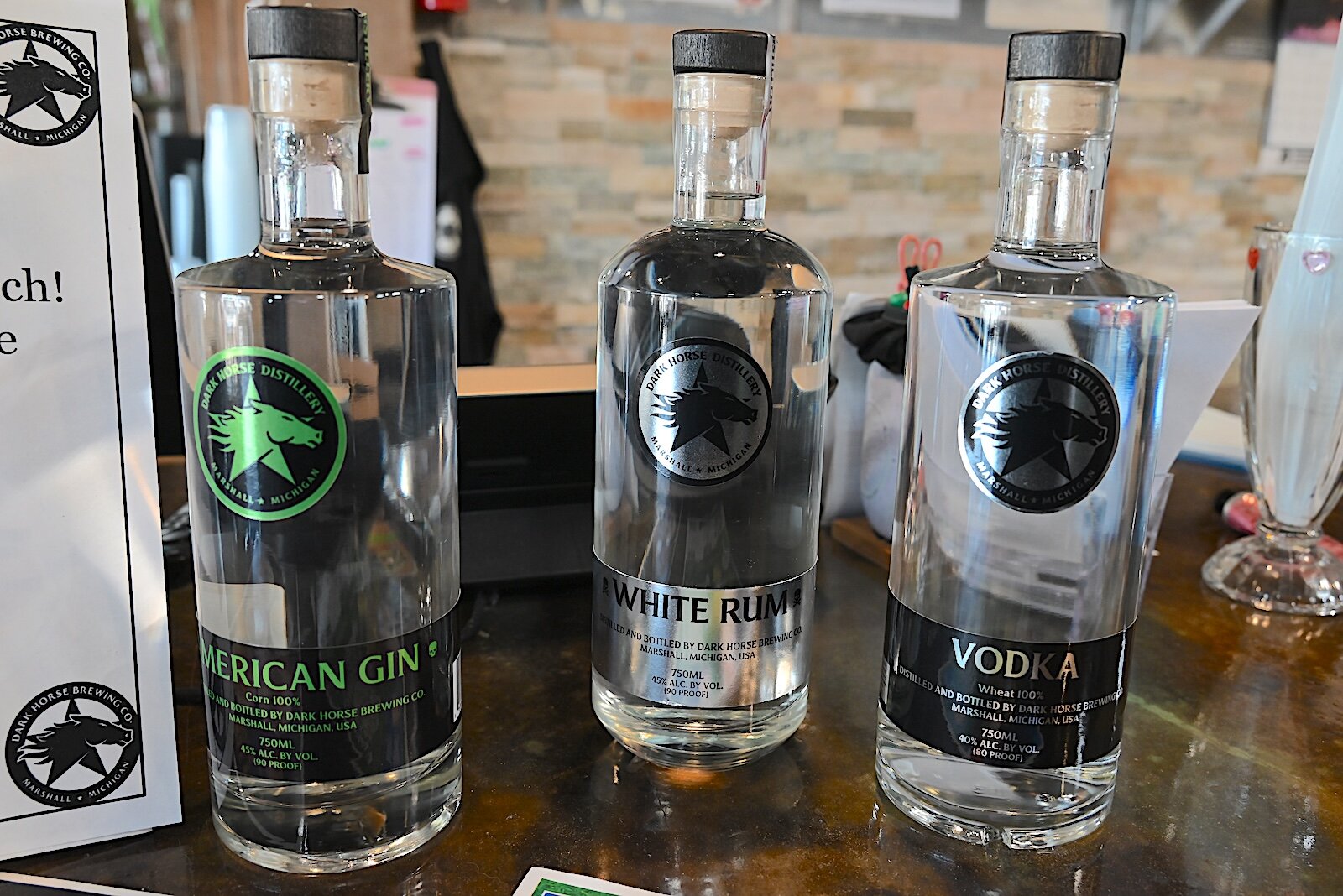 Gin, rum, and vodka are distilled and sold by Dark Horse.