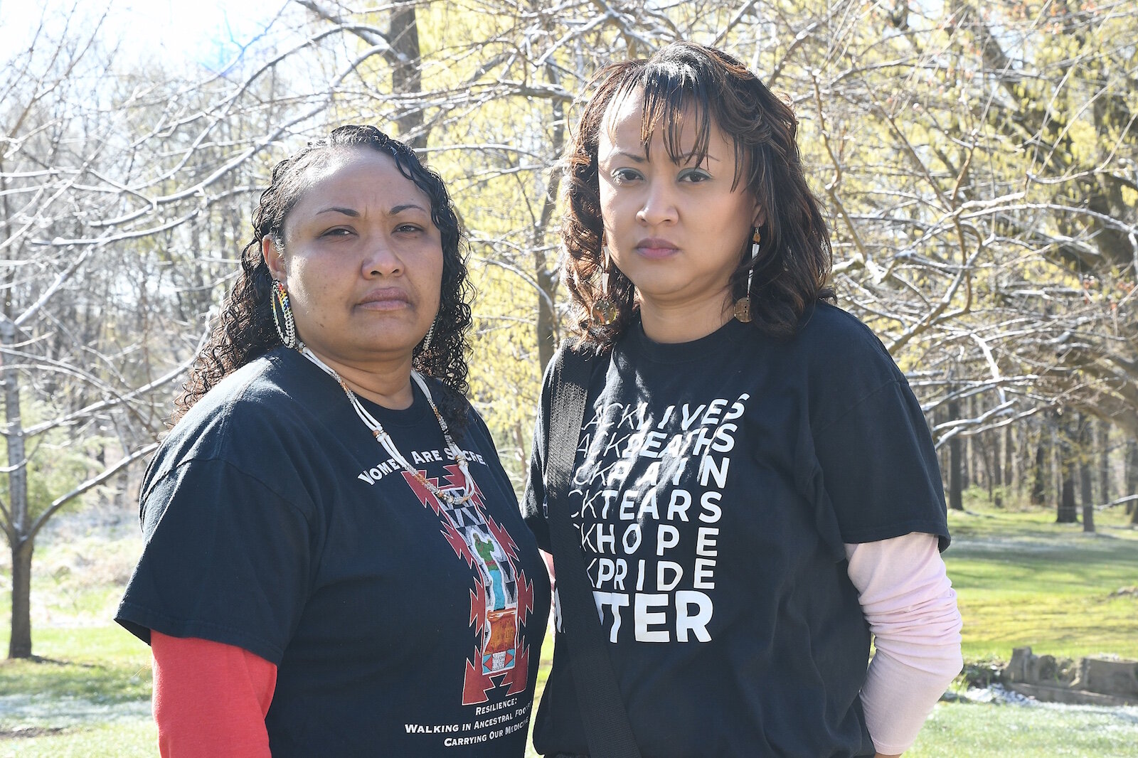 Mariesha Keith and Nickole Keith stand near the memorial at the Nottawaseppi Huron Band of Potawatomi’s Pine Creek Indian Reservation.