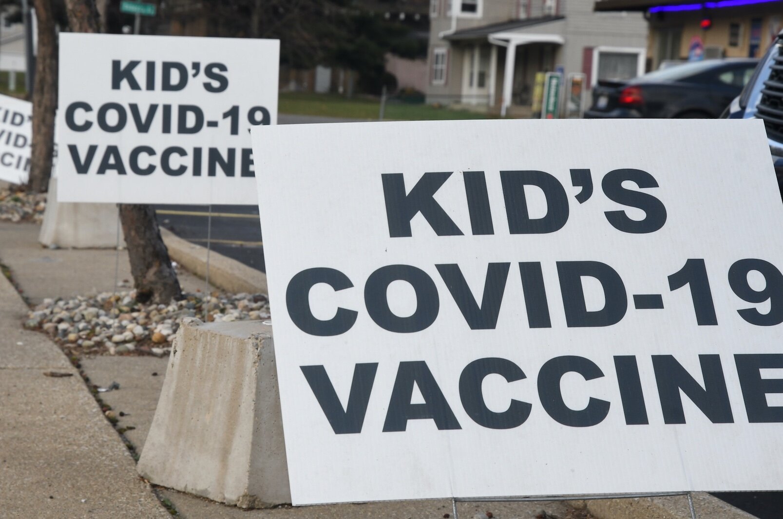 COVID vaccine signs are available outside many pharmacies, like Luxcare Pharmacy on Capital Avenue SW in Battle Creek.