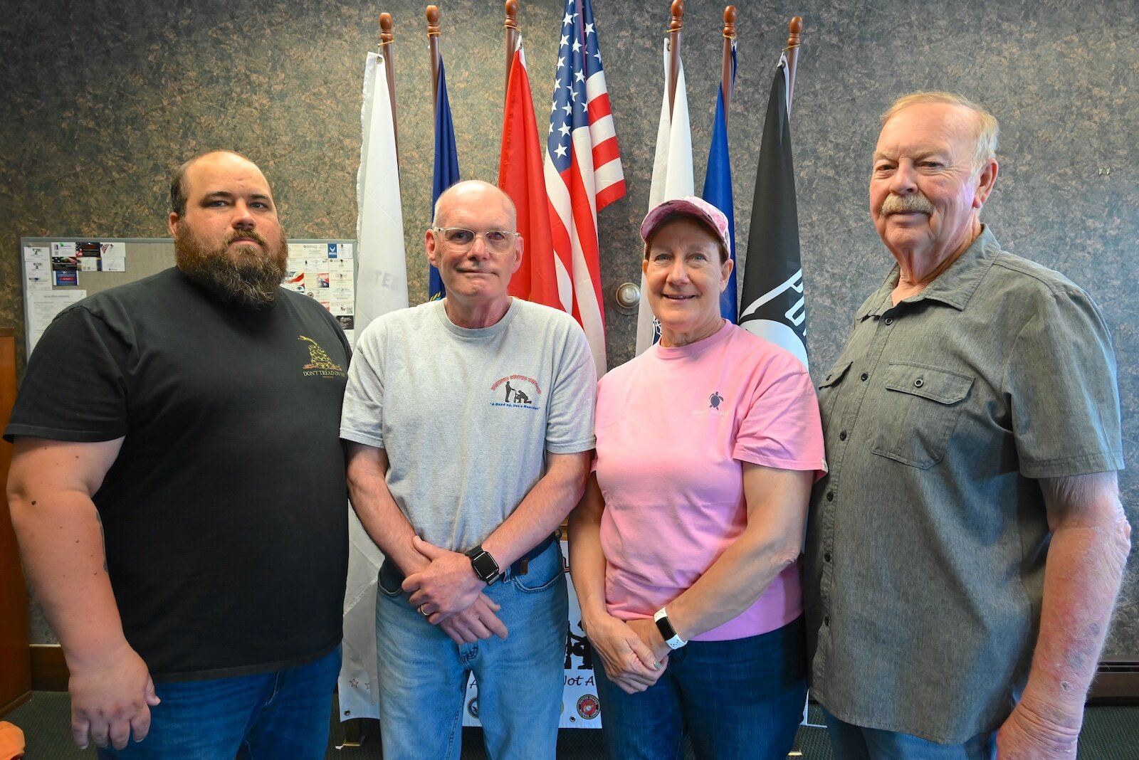 Standing inside Veterans Helping Veterans’ new oﬃces are, from left, Ben Mays, (Service Oﬃcer of Disabled American Veterans), Rick Stover (Vice-President for Administrative Services), Cindy Dawson (Vice-President for Operations), and Larry Bales (Pre