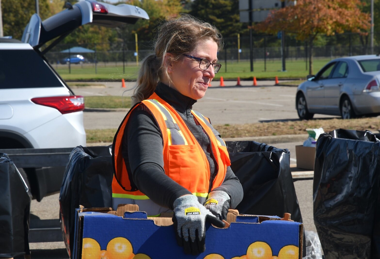 Sarah Lundy, the Calhoun County Recycling Coordinator, oversees a recent public hazardous waste disposal event at Bailey Park in Battle Creek.