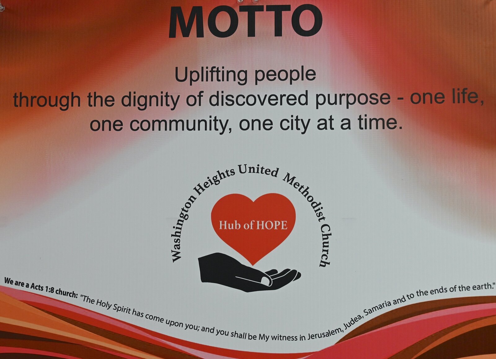 A sign in the board room at Washington Heights United Methodist Church indicates the motto of the church. 2 Rev. Monique French, pa