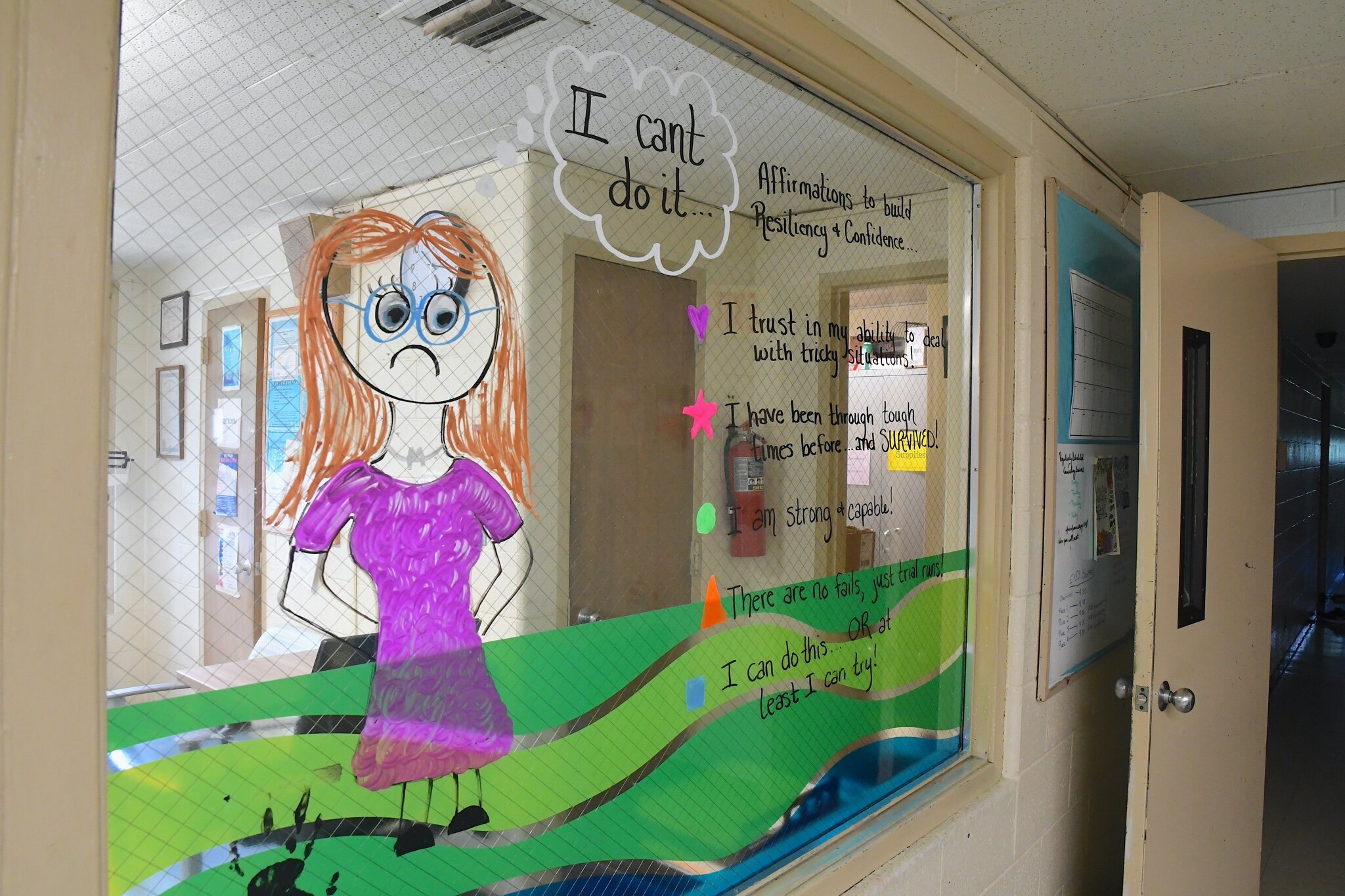 Sign and window painting inside the Calhoun County Youth Center