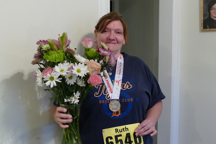 Ruth Decker and her flowers after she participated in the Borgess Run For The Health Of It