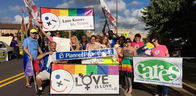 Walking with Planned Parenthood in Battle Creek Pride Parade.