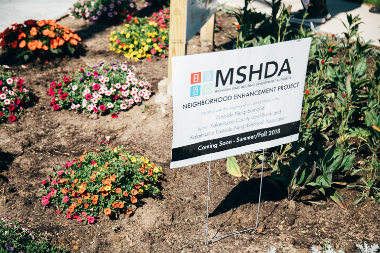 The Eastside Gateway features a public pocket park and labyrinth, flowers planted courtesy of Kalamazoo in Bloom by Eastside resident and Garden Educator CJ Drenth and volunteers.