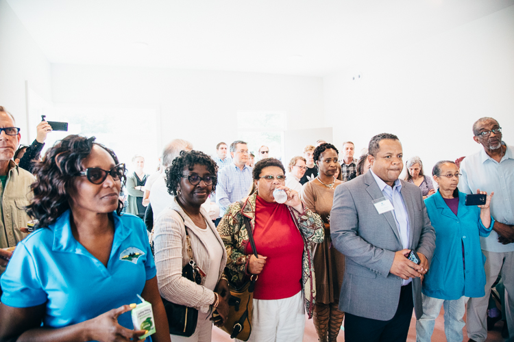 Visitors listened to brief speeches by Michael Seals, Kelly Clarke and Kathy Jennings about the Eastside neighborhood, the Eastside Gateway and the On the Ground Eastside coverage.