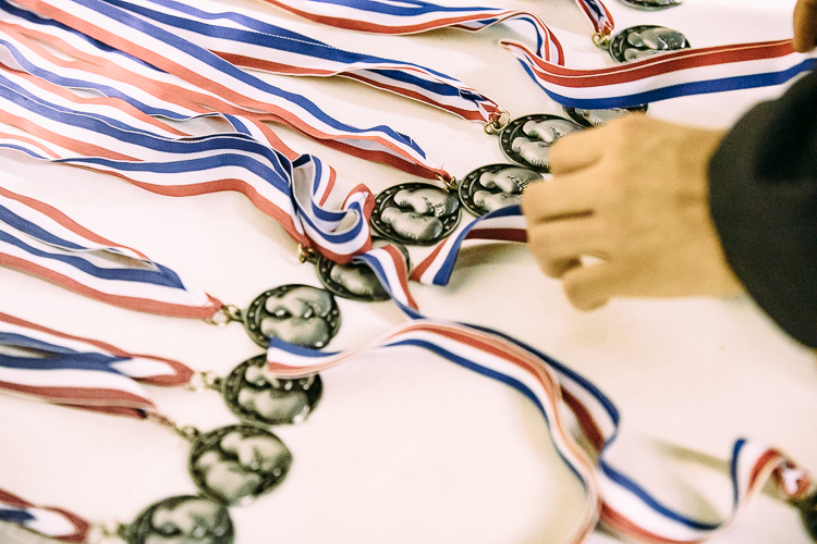 Many boxers eyed the table filled with trophies and medals before the 13 scheduled matches of the evening at the Kalamazoo Eastside Boxing show.