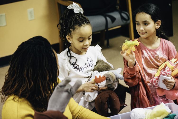 Dolls and stuffed animals provide lots of play options for CHAMPS youth.
