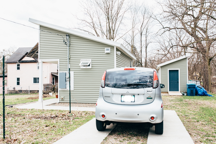 Proud to conserve energy, Ben Brown owns an electric Mitsubishi ie MiEV.