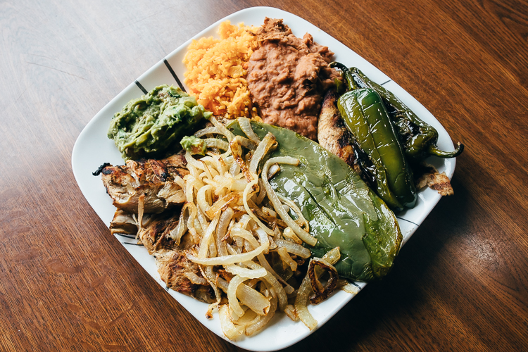 In addition to tacos, a patron favorite, Lolita’s serves several plates, including this Carne Asada, a thin grilled steak with grilled cactus, grilled onions, avocado, and refried beans.