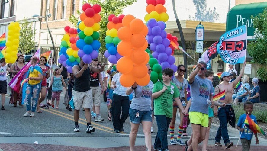 People march in the 2017 Pride Month parade led by Charlie Fulbright, former president of BC Pride and a trustee with the Battle Creek Public Schools Board of Education.