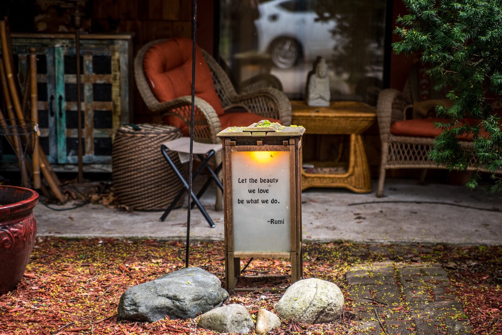 Wooden poetry lanterns that adorn the yards of several houses are gifts from Tom Kostrzewa.