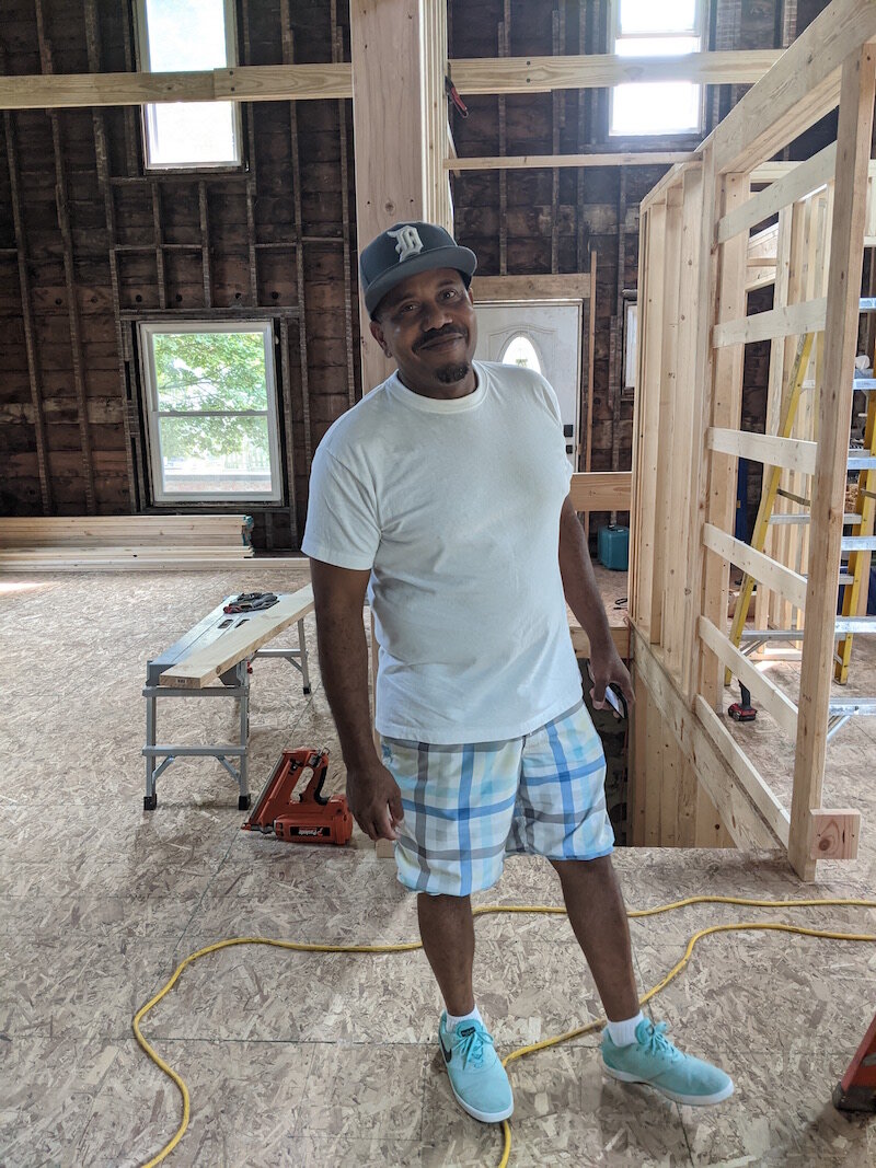 Raul Maysonet, Founder and Pastor of Hood Church, a community outreach ministry, stands inside a house at 24 Arthur Street that is being converted into a faith-based aftercare home for men.