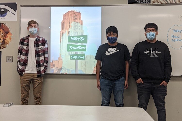 From left are Jarefd Scovel, Ian Sanchez, and Ivan Esquibel, all seniors at Battle Creek Central High School. Their presentation focused on historical places in Battle Creek.