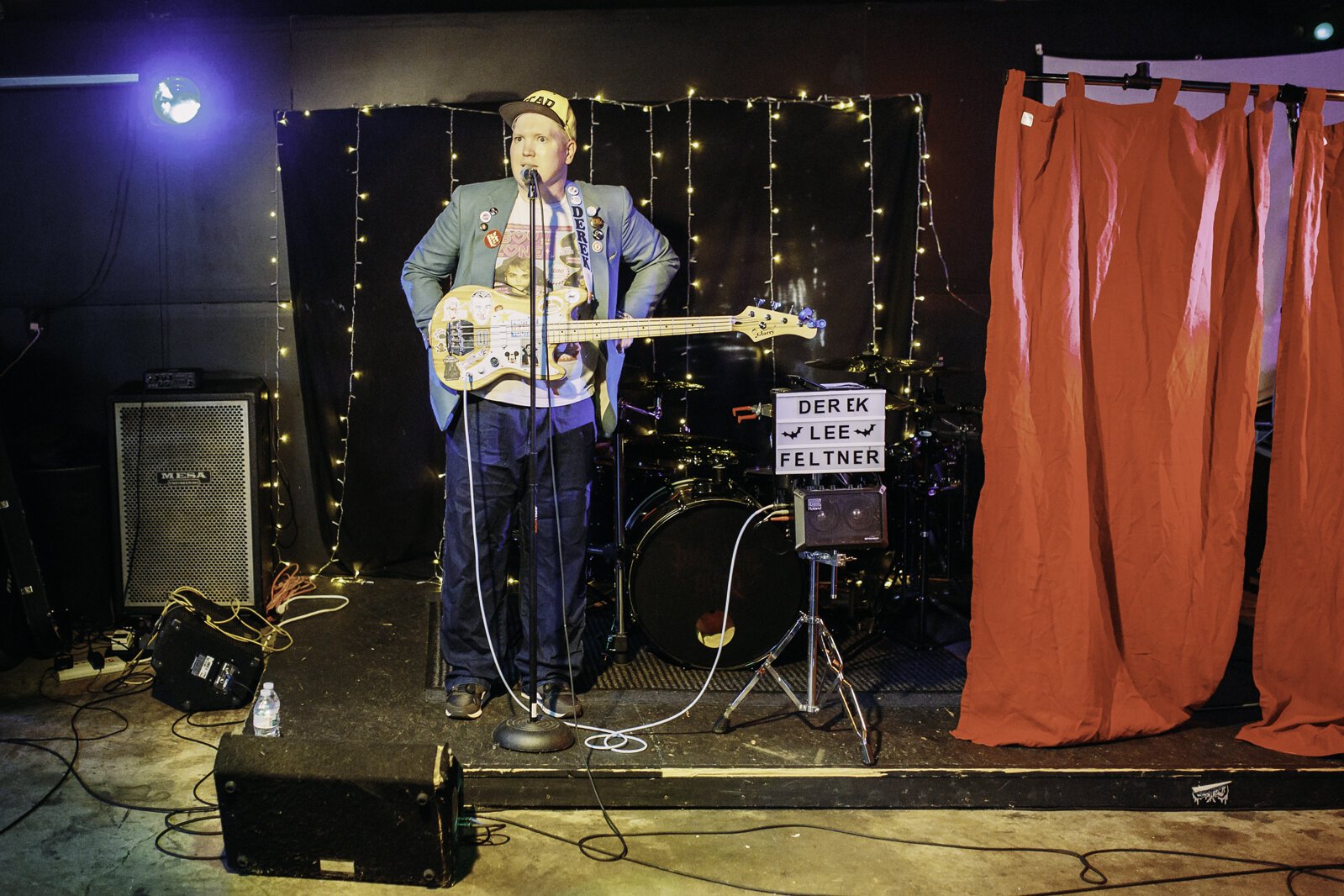 Local comedian Derek Lee Feltner opened. To close his set, he ripped off his clothes to reveal a bodysuit, and ran out the door, as his impersonation of Arnold Schwarzenegger's nude appearance in "The Terminator."
