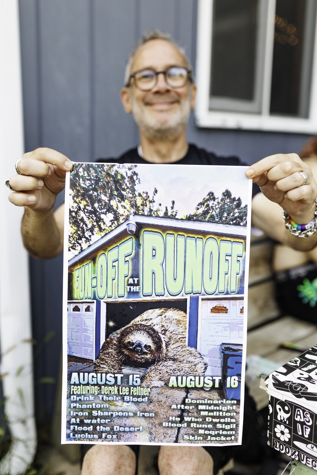 Marty Burgess with the flyer for the weekend's "Fun-Off at the RunOff."