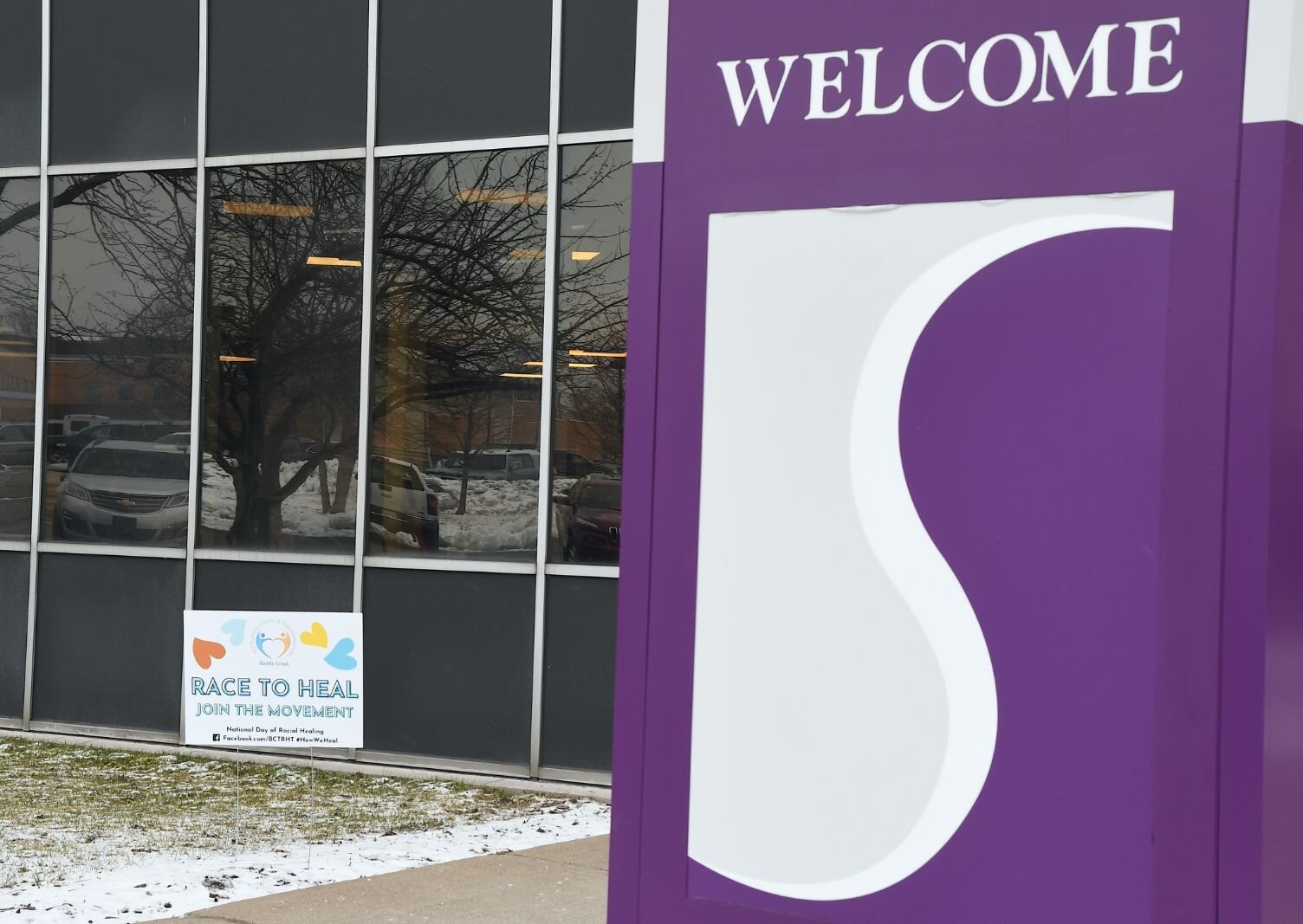 Racial healing sign at the entrace to Summit Pointe in downtown Battle Creek.