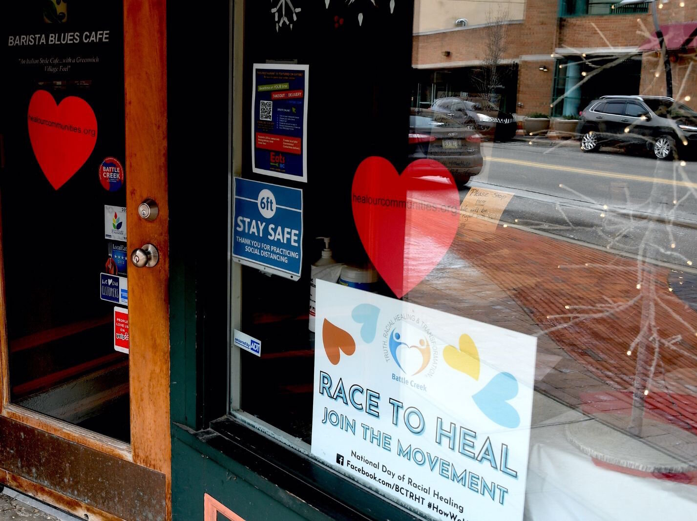 Racial healing sign at Barista Blues on West Michigan Avenue in downtown Battle Creek.