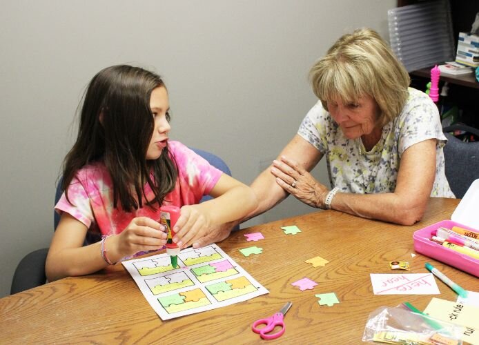 Rayla works with her SLD Tutor.