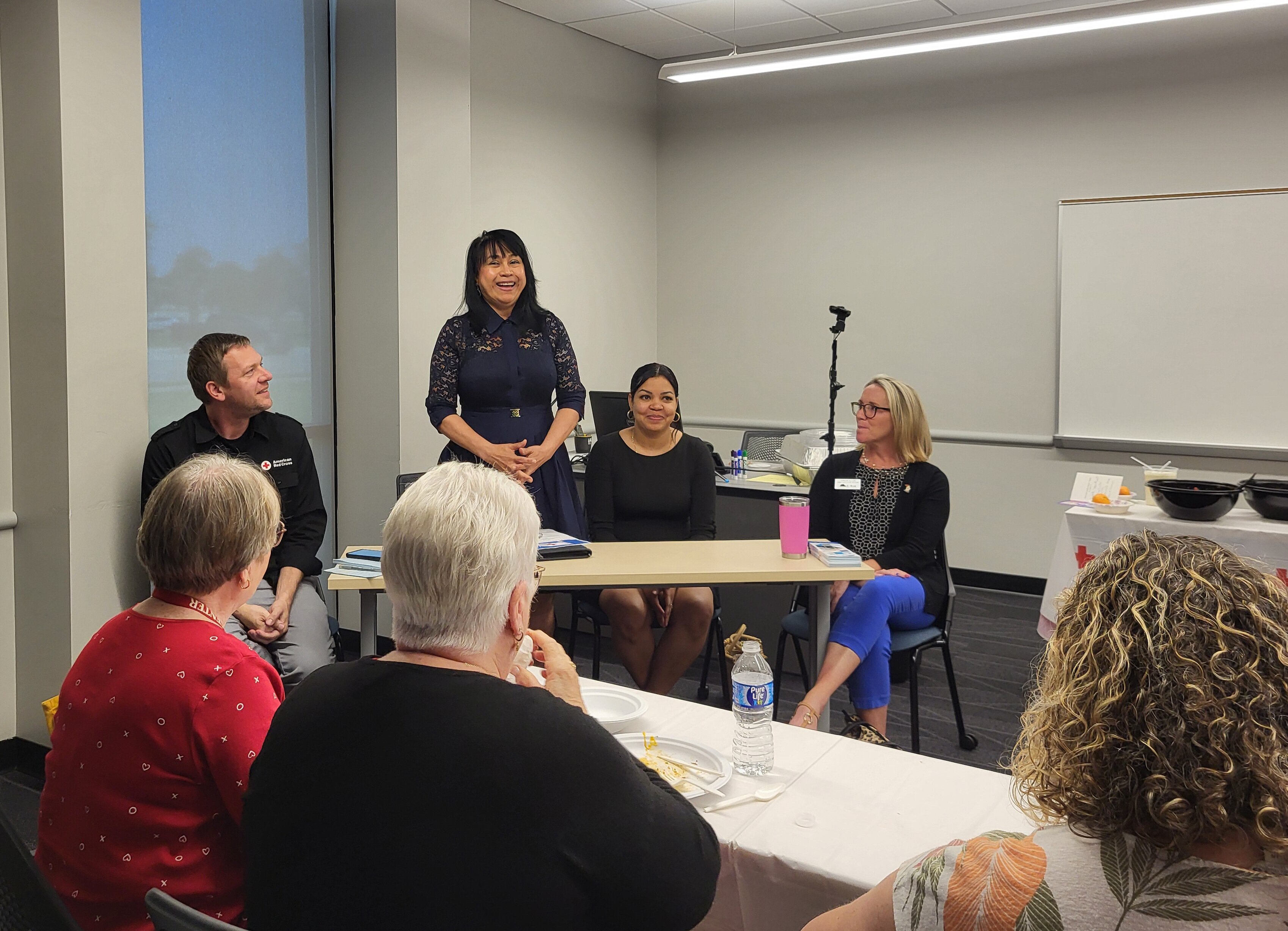 Justin Kern of the American Red Cross (left) was joined by Maria Graniela and Marian Guzman of Voces, as well as Teresa Allen (far right) of Charitable Union during a lunch conversation at the disaster preparedness training.