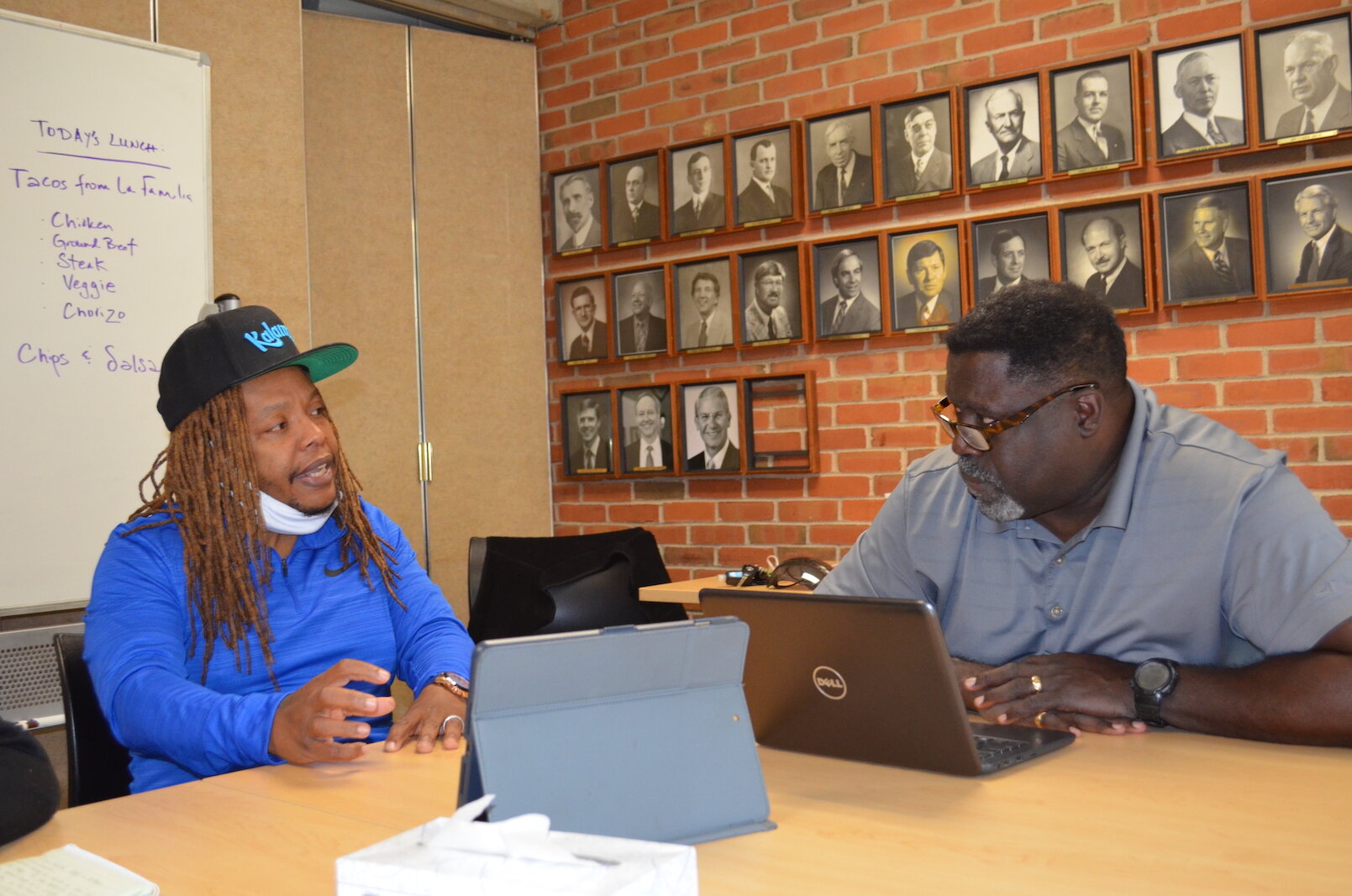 Michael Wilder, coordinator of the city of Kalamazoo’s Group Violence Intervention Program, with Voices of Youth Mentor Al Jones.