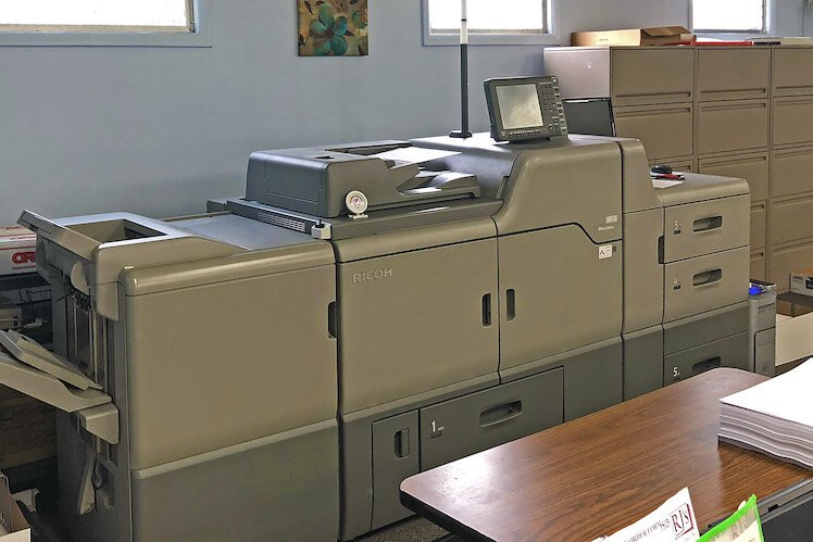 A commercial laser printer helps get jobs done quickly.