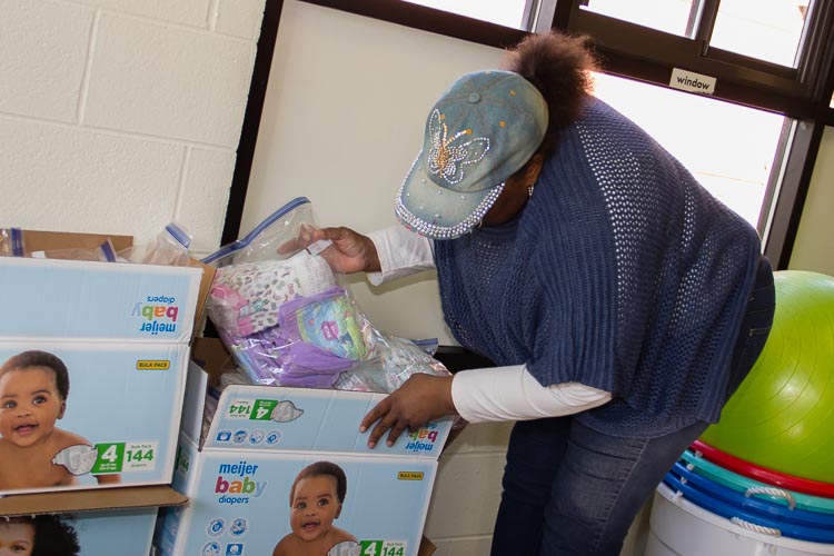Denise Rucker, a program coordinator, started out as a volunteer with the diaper distribuiton program.