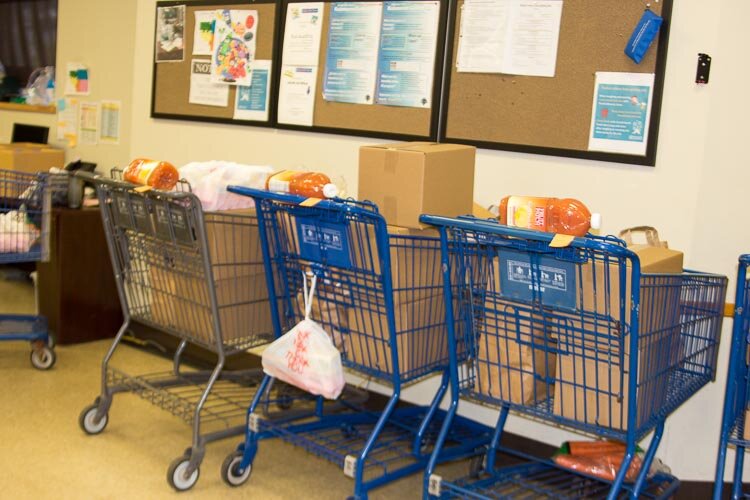 Packages collected for pickup are lined up at Loaves and Fishes.