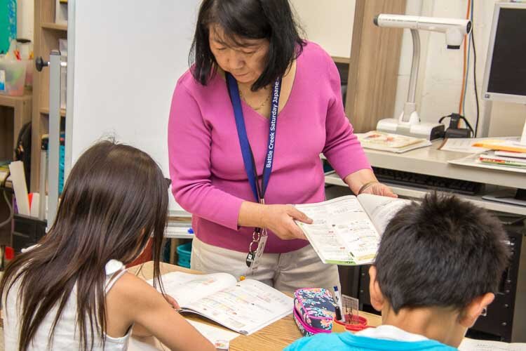 Third grade teacher Jinko Oyake teaching class. 