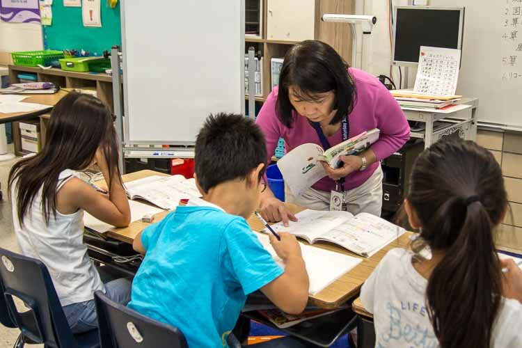 Third grade teacher Jinko Oyake teaching class. 