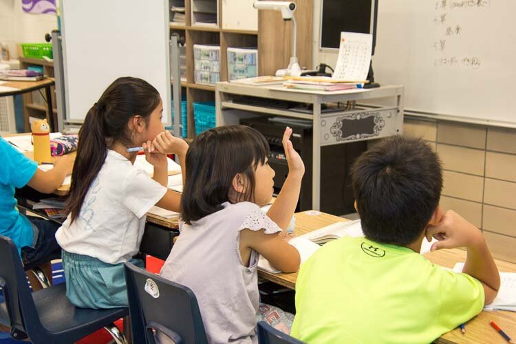 Students learn a Japanese curriculum.