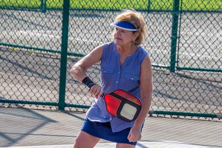 Enjoying a game of Pickleball.